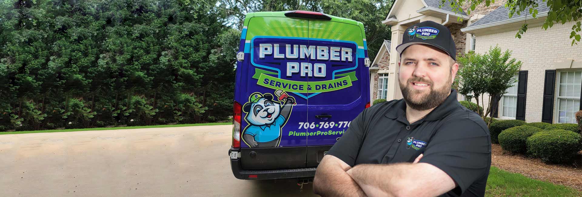 owner of gwinnett plumber pro standing in front of his van